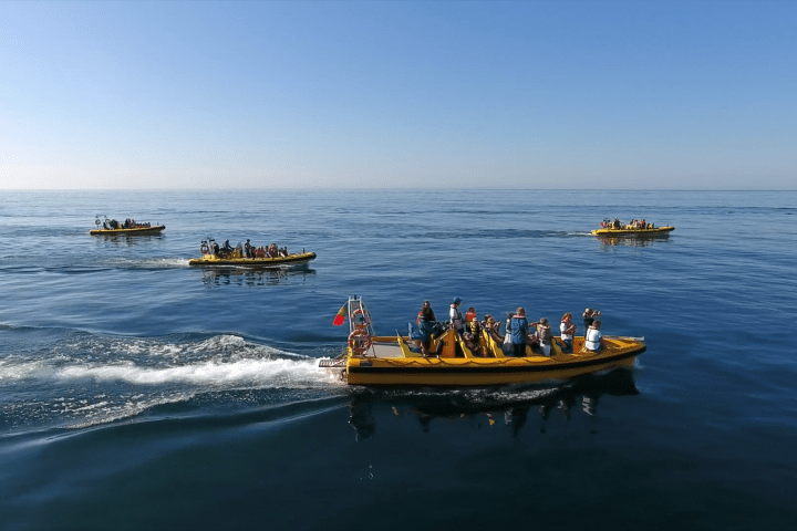 a small boat in a body of water