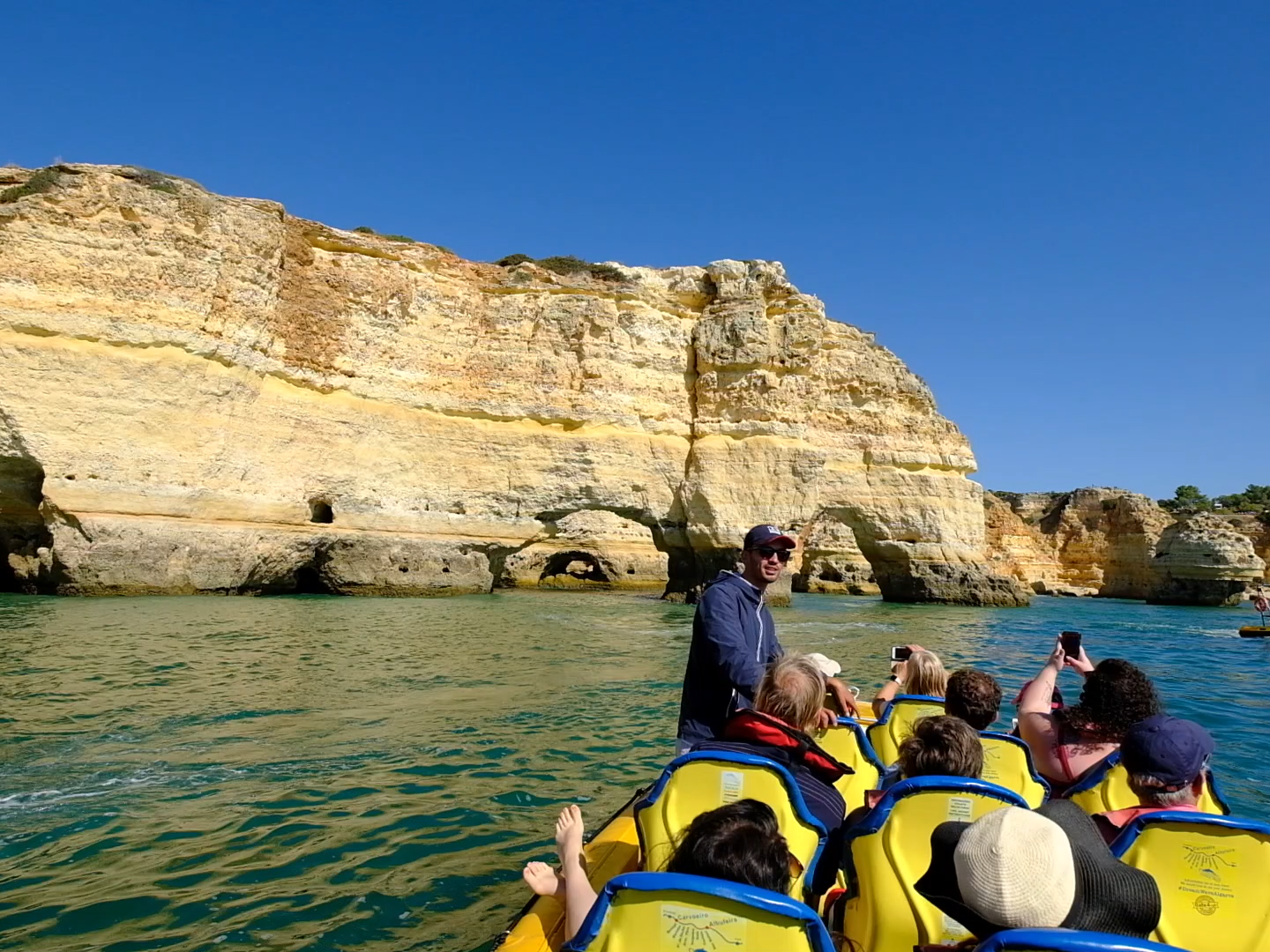 a group of people on a raft in a body of water