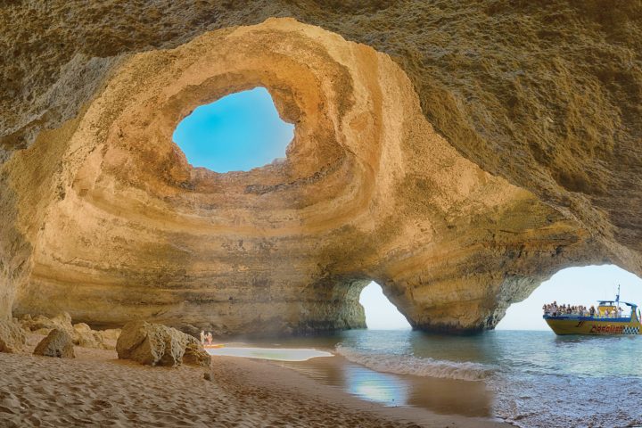 a doughnut sitting on top of a rock