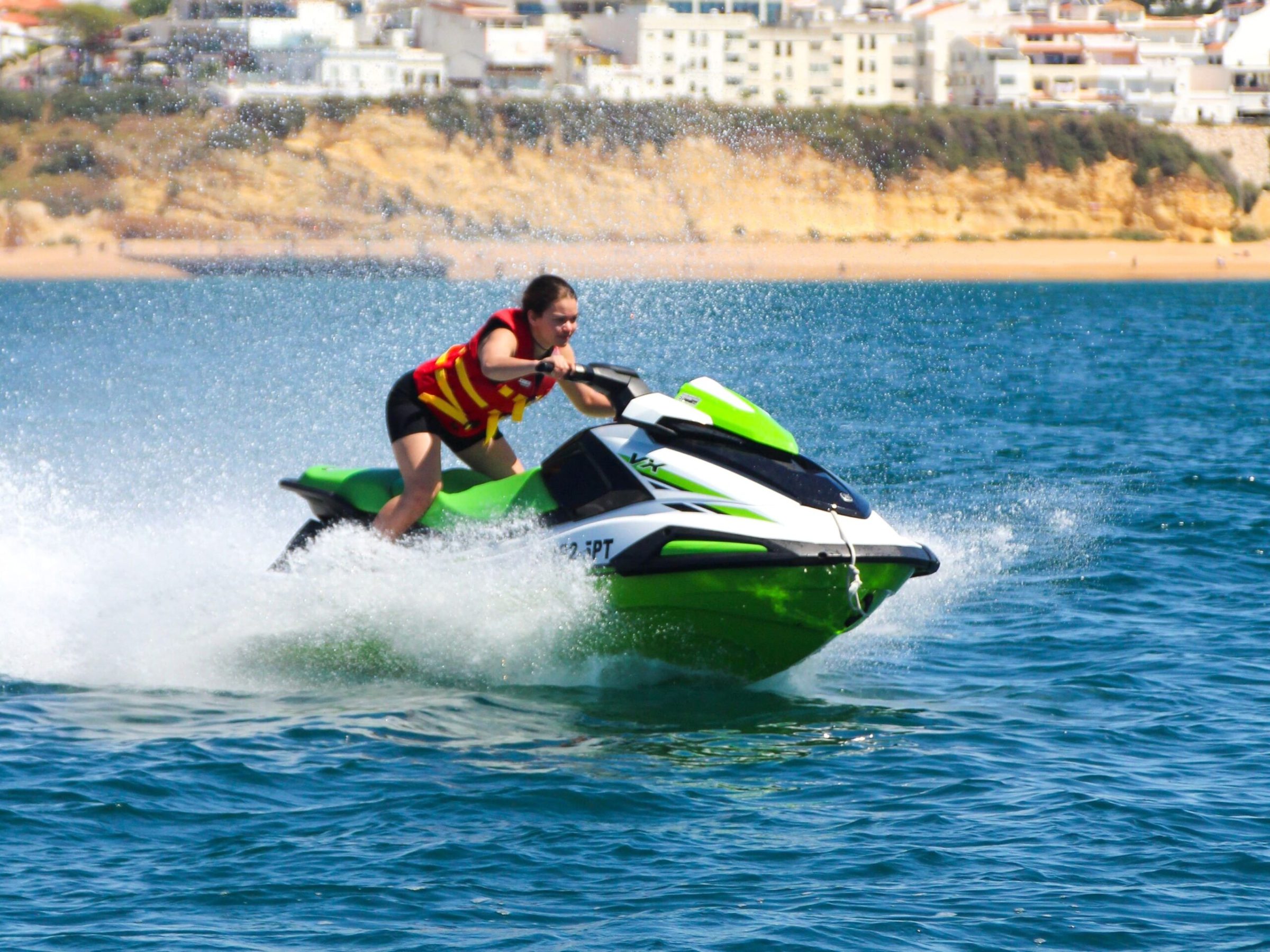 a man riding a wave on a surfboard in the water