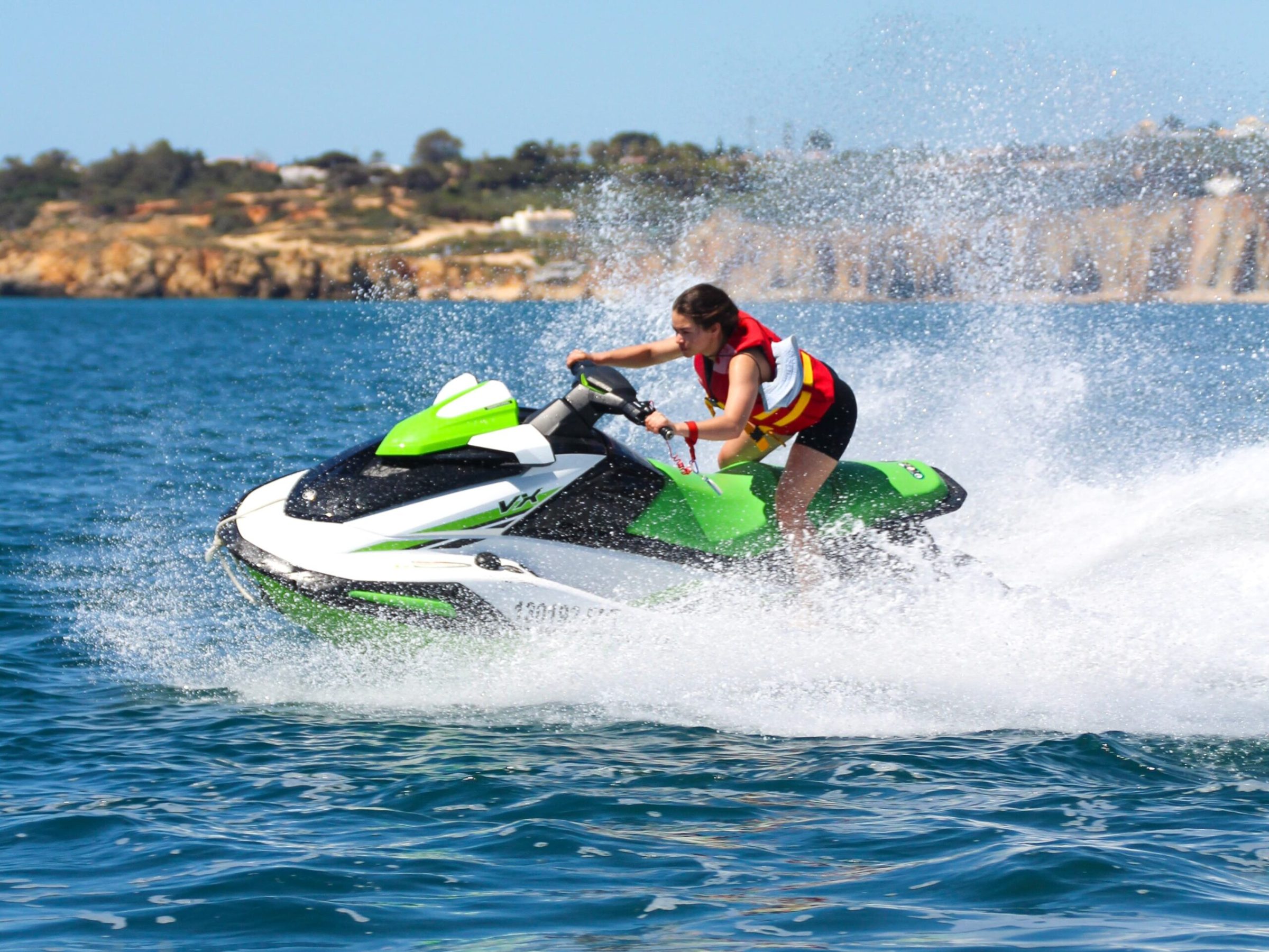 a man riding a wave on a surfboard in the water
