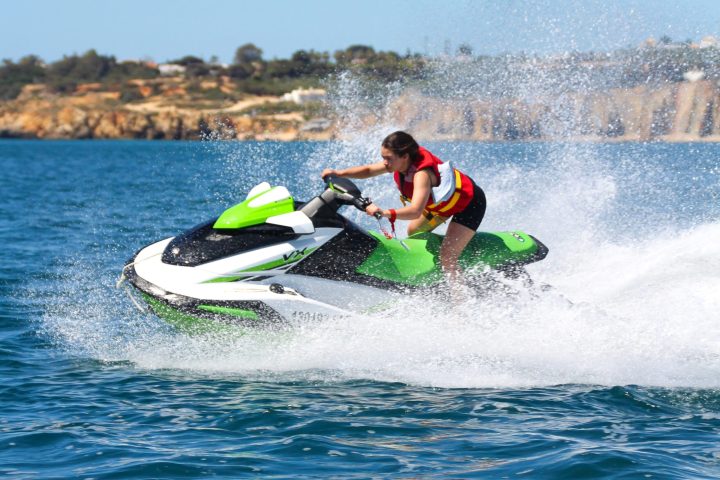 a man riding a wave on a surfboard in the water